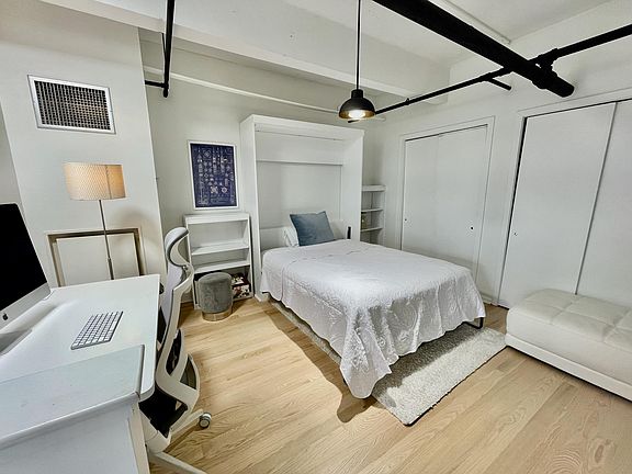 Loft bedroom with bed
