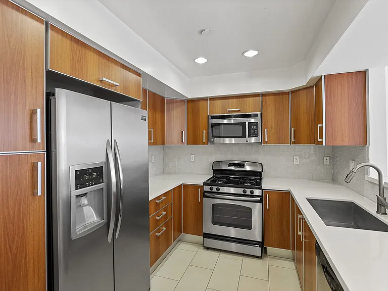 Kitchen with Energy-Efficient Refrigerator, Stove, Microwave Oven, and Dishwasher