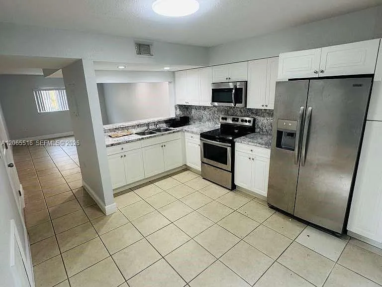 8270 SW 149th Ct #10-209 — Photo 6