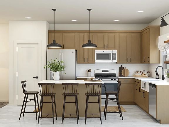 Kitchen with center island and pendant lighting