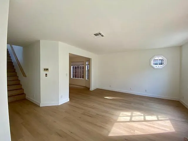 Living room with view of dining room.
