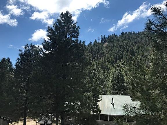 This photo shows the northern most area of the property looking west over a house on Shatuck Road above the property.
