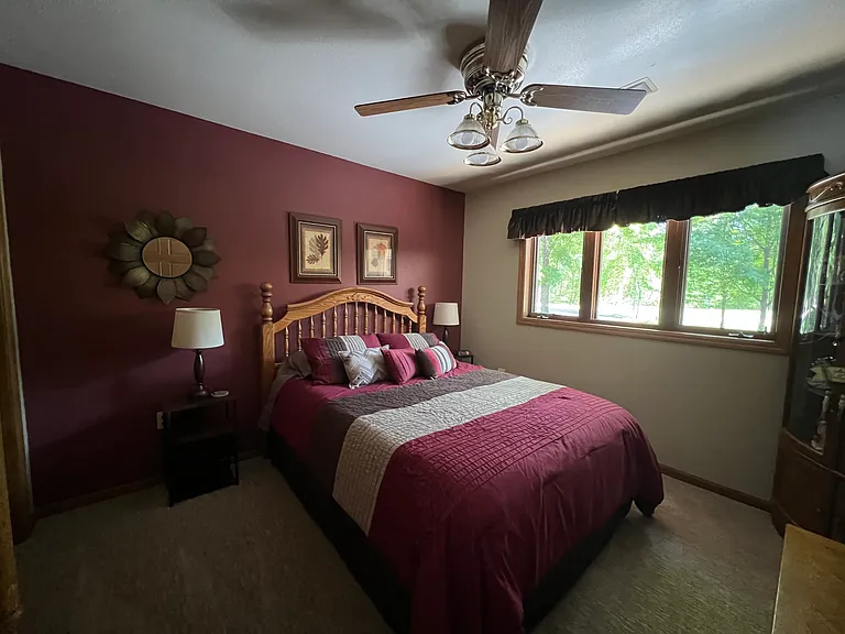 Main Level Second Bedroom with queen bed