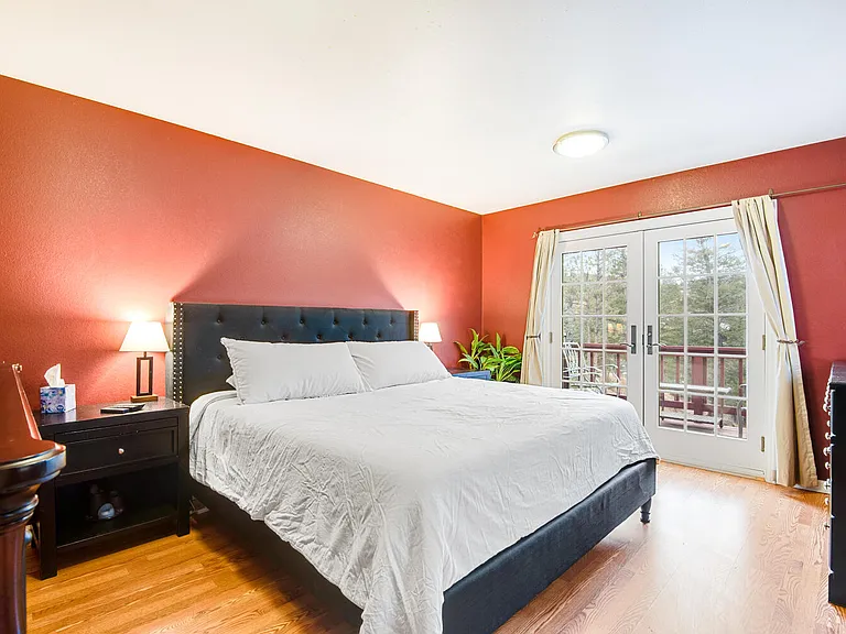 Large master bedroom suite with private deck