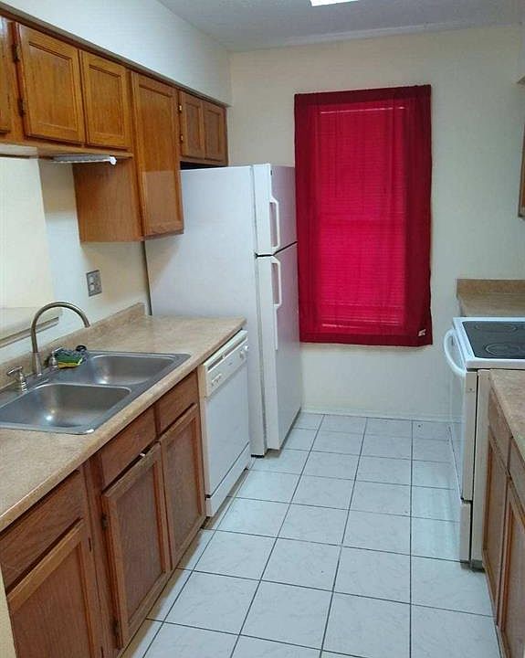 1st image of 10555 Turtlewood Ct Unit 1802
