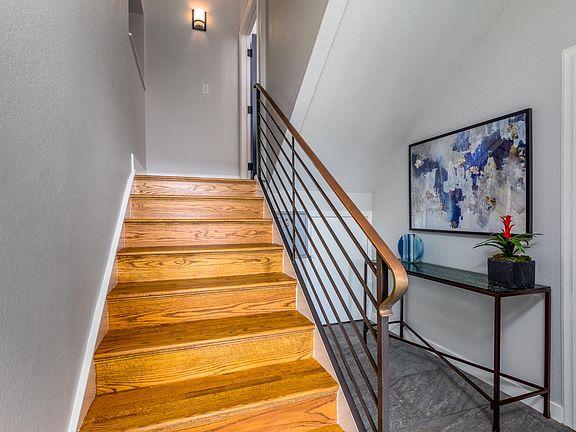 Entry stairs from lobby to front door to condo