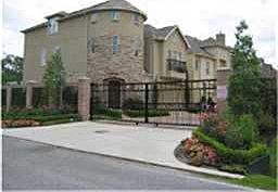Automatic gates with beautiful entrance, homeowners association pride of ownership