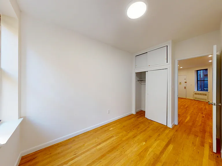 417 E 65th St #8 — Photo 11
