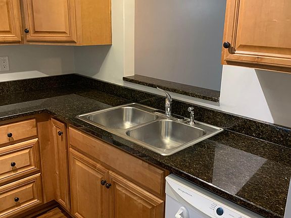Kitchen with pass through to dining room.