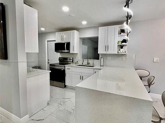 5th image of 6120 SW 15th Ct