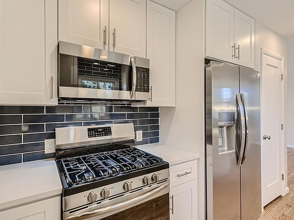 Bright and new kitchen with new appliances.