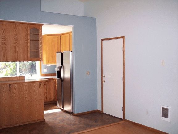Kitchen/Living Room and door to the 2 car garage
