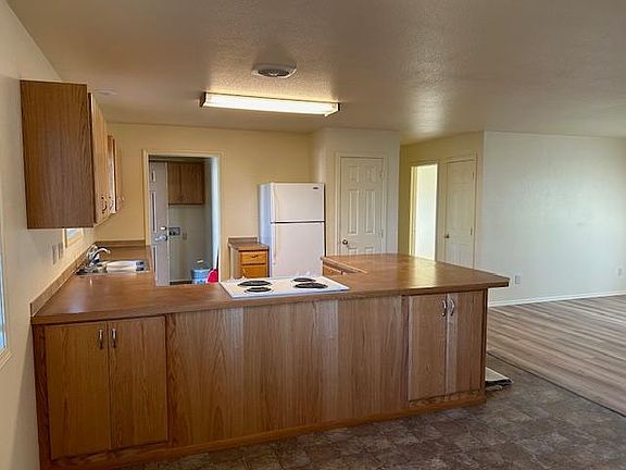 Kitchen with open floor plan to living room