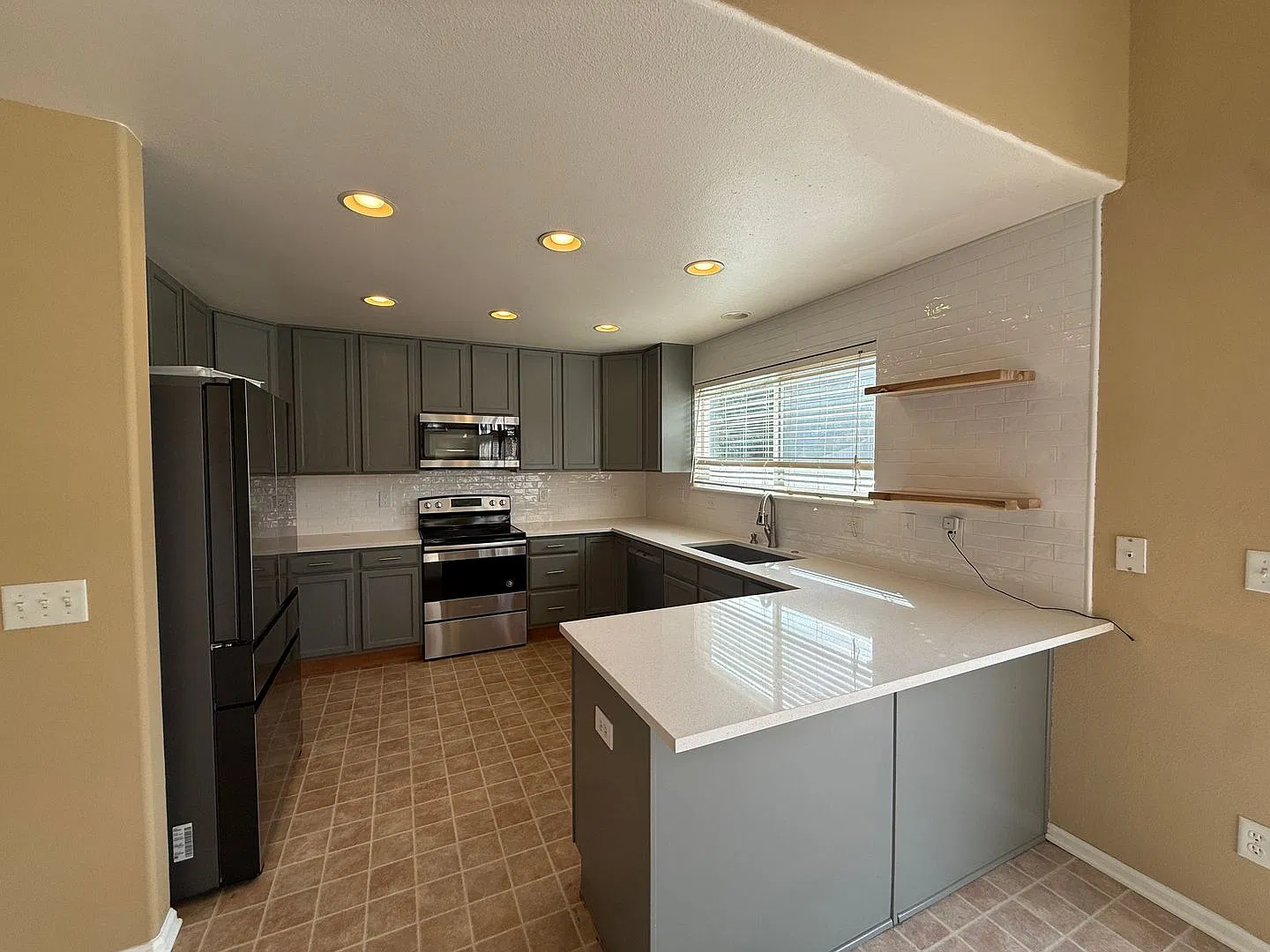 Spacious 4-Bedroom Home | Finished Basement | 3-Car Garage | Near Powers — Photo 4
