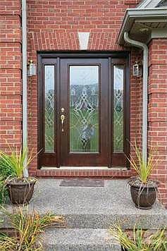 Elegant entry way opens to a beautiful foyer and sitting (or formal dining room)