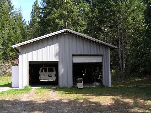 Two+car garage has electric and plumbing