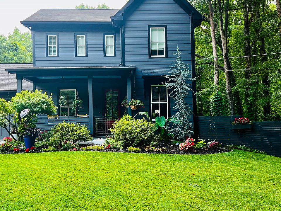 Professionally landscaped yard, filled with perennials and pollinator garden
