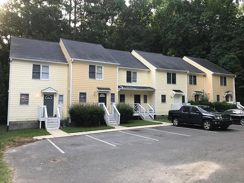 Published Unit, with porch, 3rd from left.