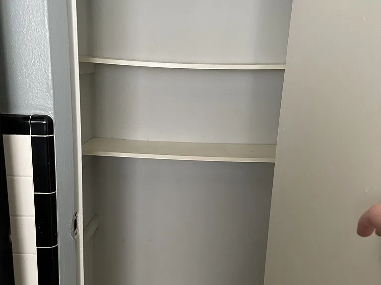 Pantry next to fridge