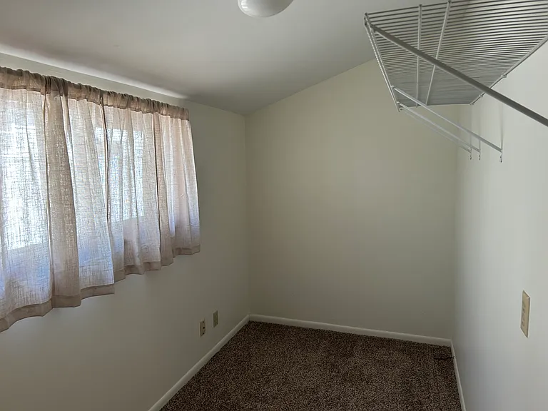 Second bedroom 6'8" x 12' without closet, or use as an office with separate entrance.