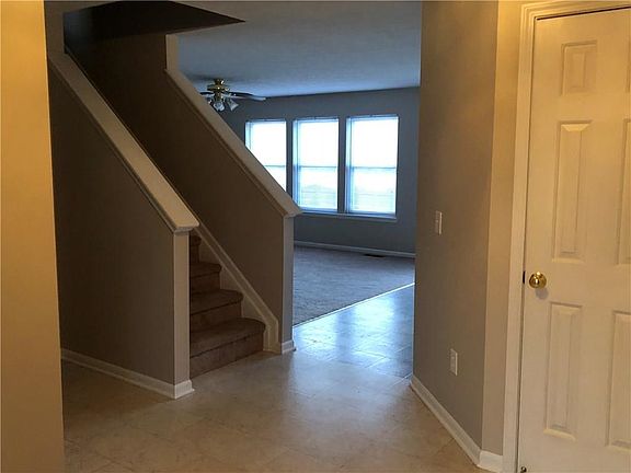 View from the entry way.  The entire home has been professionally painted Feb. 15, 2018!  The color is Realist Beige from Sherman Williams - it's a beautiful light, neutral and modern shade of beige! Perfect for any home decor!