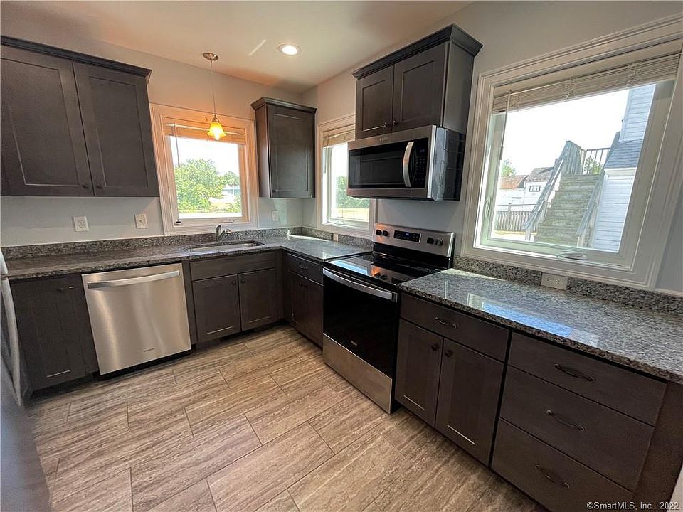 Beautiful updated kitchen with stainless steel appliances and granite countertops