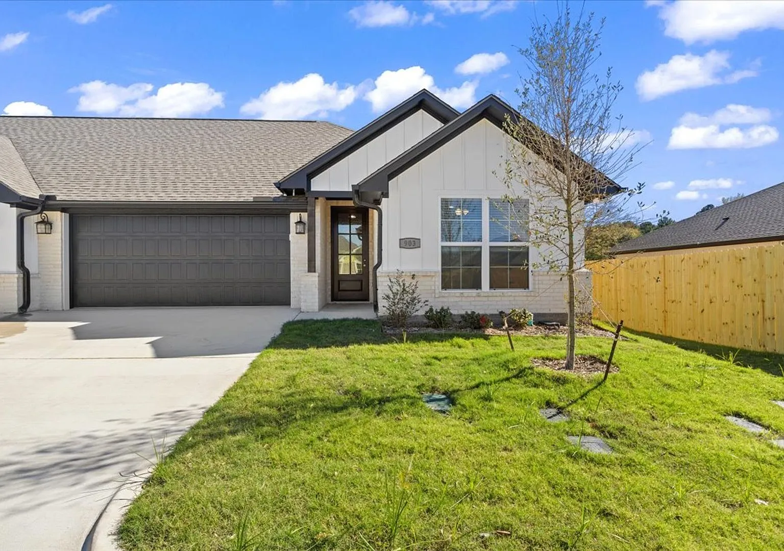 The Town Homes at Lindsey Park — Photo 1