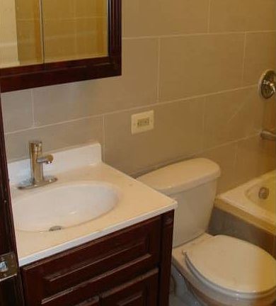 Fully Tiled Bathroom