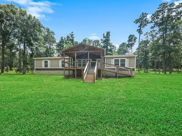 577 Winding River Rd S, Oakhurst, TX 77359