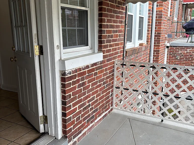 Covered Rear Porch just off Kitchen