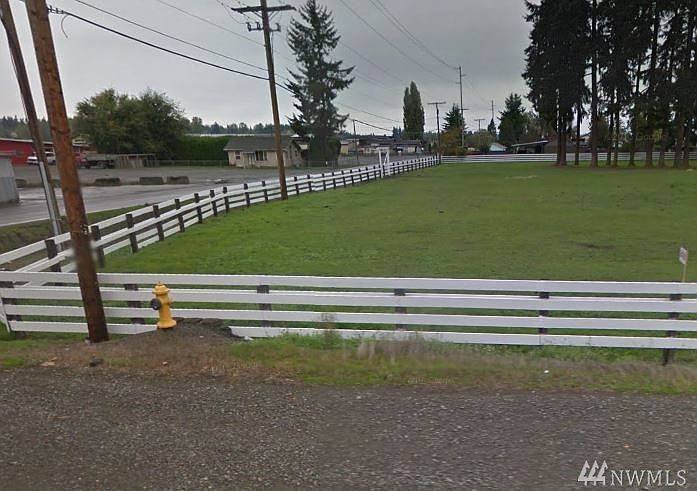 Level, Dry corner lot. 130'x380'.