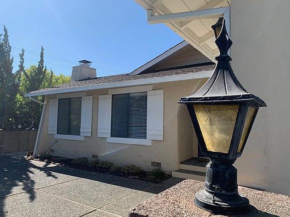 Entry courtyard from well lit driveway