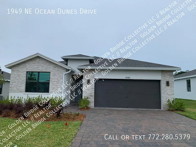 1949 NE Ocean Dunes Dr — Photo 1