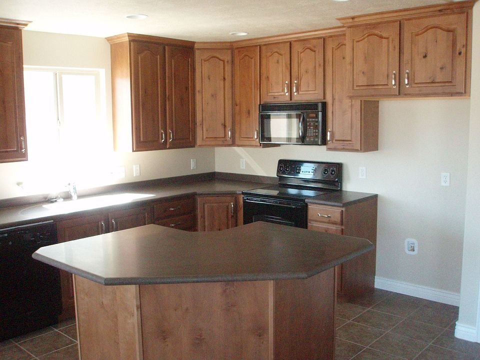 Alder Cabinets Black Appliances.