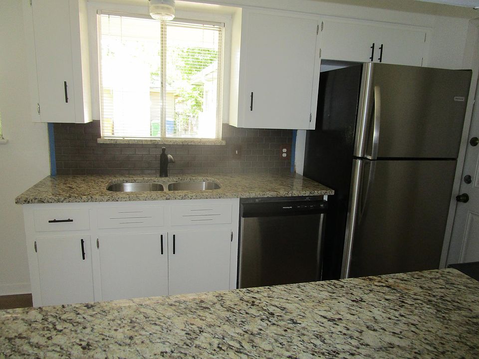 New sink, granite countertops and backsplash