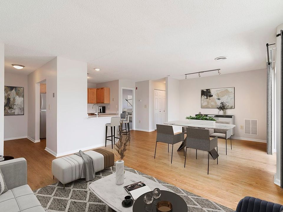 Renovated Package I living and dining room with hard surface flooring