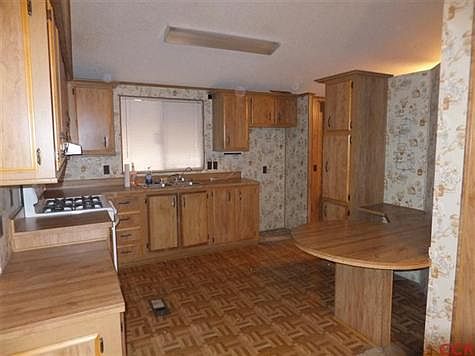View of kitchen from dining room