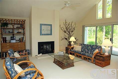 Living Room with gas fireplace and cathedral ceiling