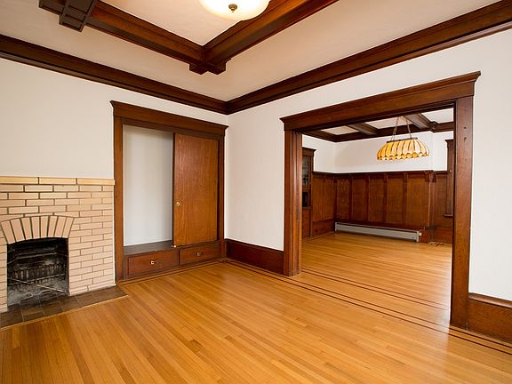 Living room has fireplace
