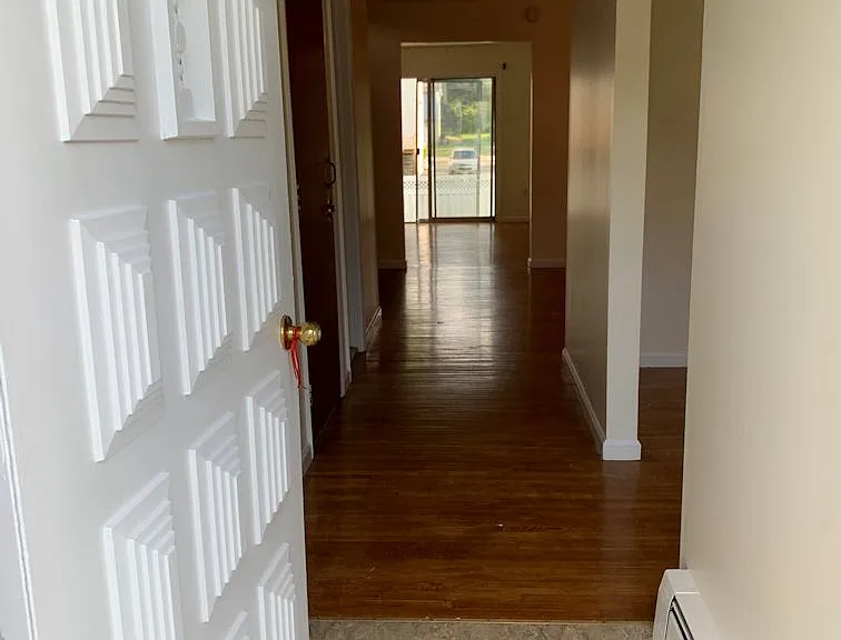 Front Door Entry Hallway (right is the Living Room )