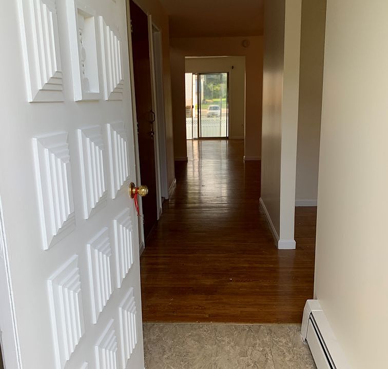 Front Door Entry Hallway (right is the Living Room )