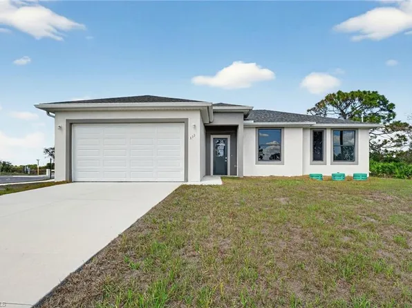 560 Genoa AVE S, LEHIGH ACRES, FL 33974