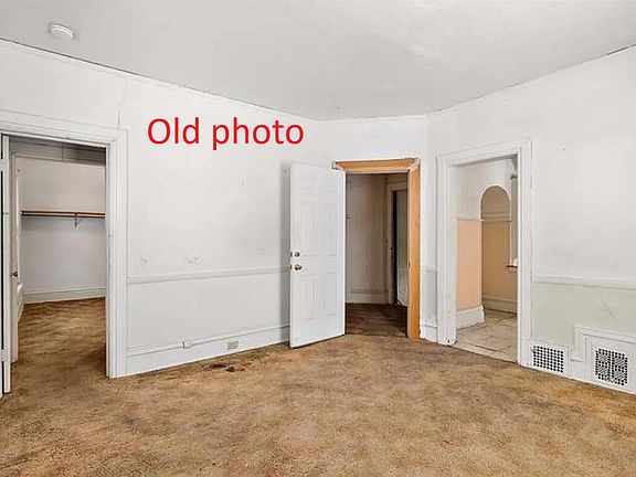 OLD PHOTO! This room is patched and painted, carpet will be last/soon!