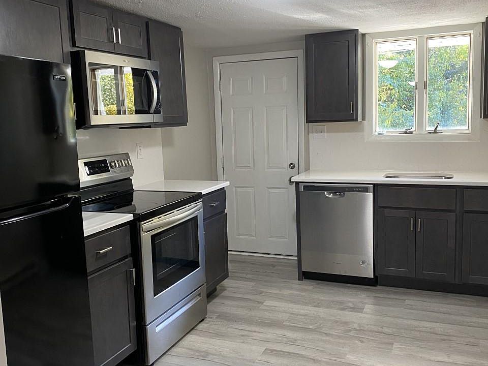 Kitchen with built in microwave and dishwasher