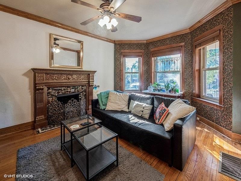 Main floor living room with hardwood flooring