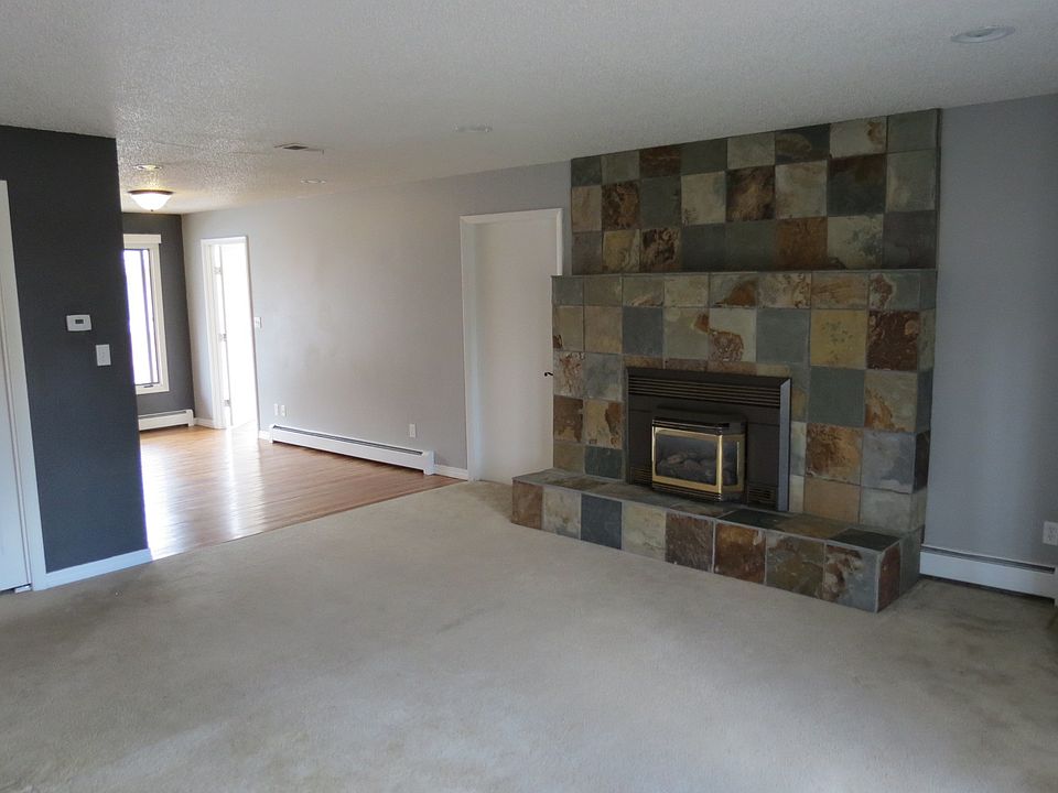 Hardwood floors in dining room and kitchen.