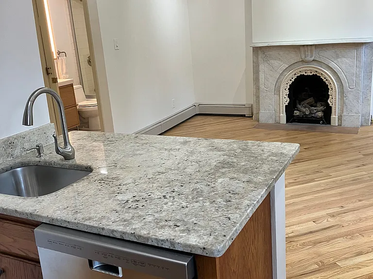 View of living room from kitchen with dishwasher