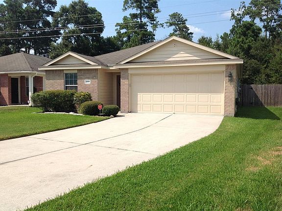 You'll notice the longer driveway and the wooded area be