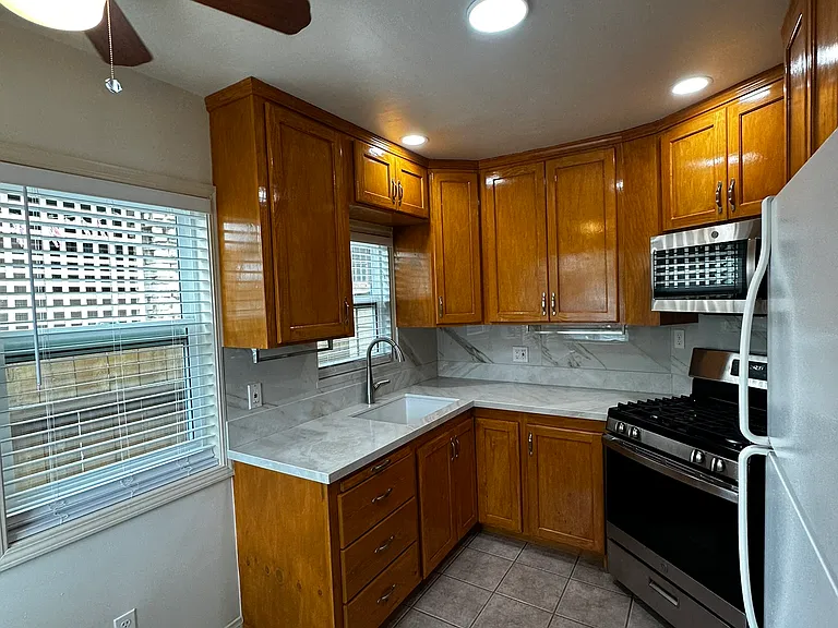 Kitchen: Marble Countertop
New Microwave & Stove
New Refrigerator
Recessed Lightings
One recessed lighing under the 
Sink to wash dishes
Lots of Cabinets & Shelves