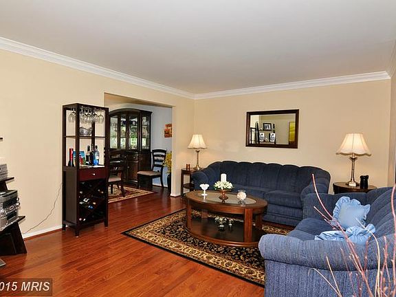 Living Room ~ hardwood flooring, bay window!